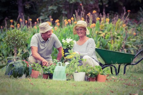 Gardener pruning plants in a Marylebone garden